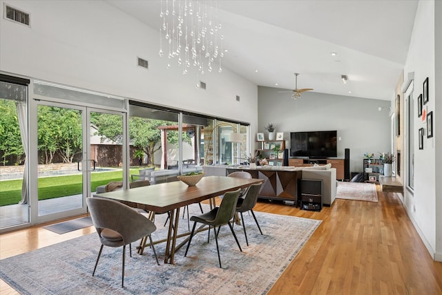 613 N Bailey Ave, Fort Worth, TX 76107 - dining space with high vaulted ceiling, recessed lighting, ceiling fan, and light wood-style flooring