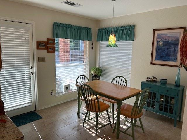 3900 Chimney Rock Dr, Denton, TX 76210 - dining area featuring baseboards