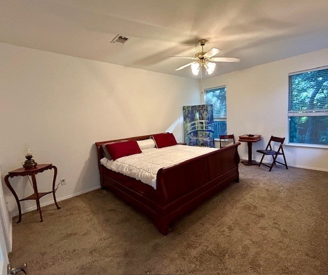 3900 Chimney Rock Dr, Denton, TX 76210 - carpeted bedroom with baseboards and a ceiling fan