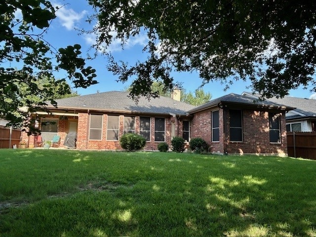 3900 Chimney Rock Dr, Denton, TX 76210 - view of front of house with a chimney and brick siding
