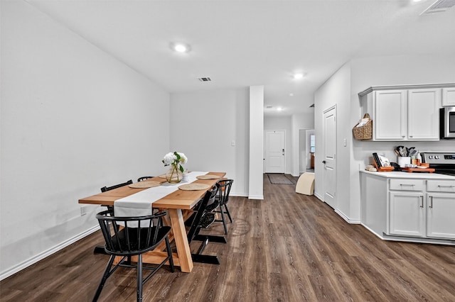 2806 Peony Dr, Sherman, TX 75092 - dining room with dark wood finished floors and recessed lighting