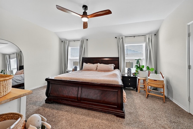 2806 Peony Dr, Sherman, TX 75092 - carpeted bedroom featuring multiple windows, lofted ceiling, and a ceiling fan