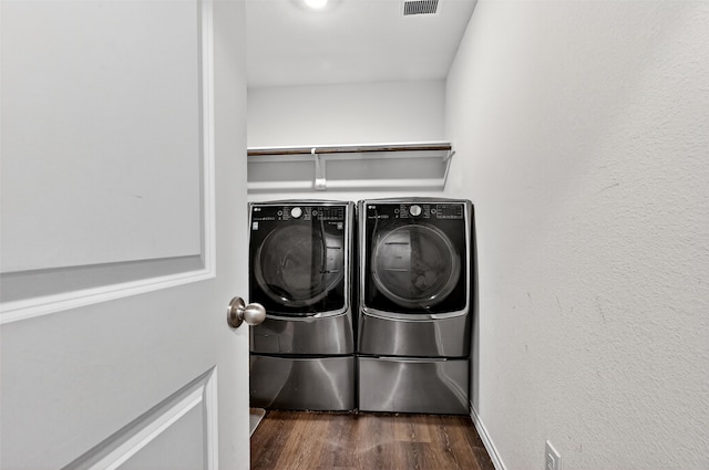 2806 Peony Dr, Sherman, TX 75092 - laundry area with washing machine and clothes dryer and dark wood finished floors