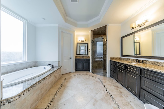13122 Dolomite Dr, Frisco, TX 75035 - bathroom with vanity, a stall shower, a garden tub, tile patterned flooring, and ornamental molding