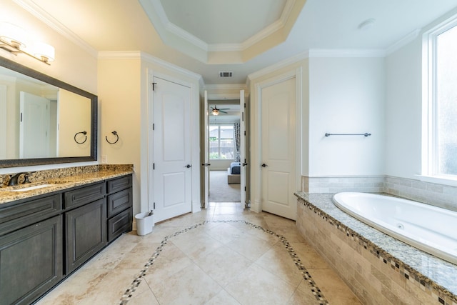 13122 Dolomite Dr, Frisco, TX 75035 - bathroom with healthy amount of natural light, a jetted tub, inlaid floor details, vanity, and ornamental molding