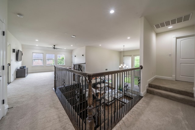 13122 Dolomite Dr, Frisco, TX 75035 - corridor with carpet floors, a chandelier, recessed lighting, and plenty of natural light
