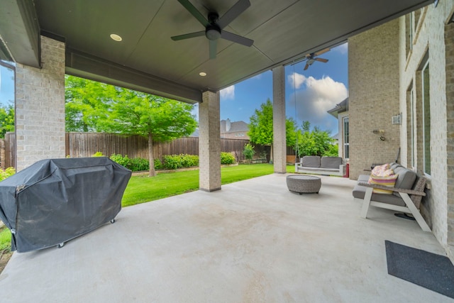 13122 Dolomite Dr, Frisco, TX 75035 - fenced backyard with ceiling fan, grilling area, a patio area, and outdoor lounge area