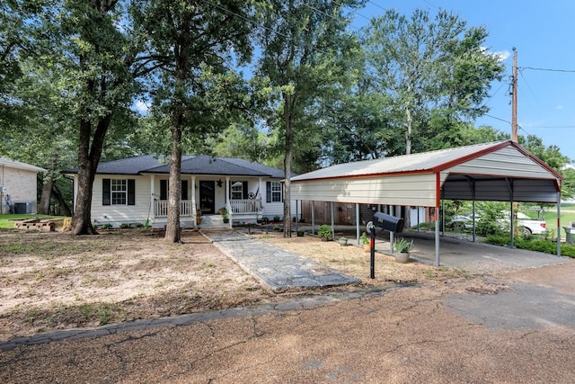 104 Nob Hill Cir, Malakoff, TX 75148 - view of front facade featuring a porch, a carport, and driveway