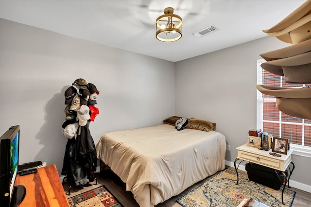 104 Nob Hill Cir, Malakoff, TX 75148 - bedroom featuring wood finished floors and baseboards