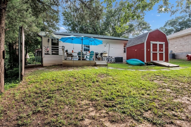 104 Nob Hill Cir, Malakoff, TX 75148 - view of green lawn with a storage shed and a wooden deck