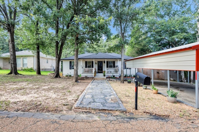104 Nob Hill Cir, Malakoff, TX 75148 - view of front of home with covered porch and a detached carport