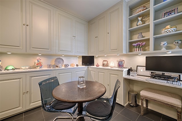 3525 Turtle Creek Blvd Unit 4E, Dallas, TX 75219 - dining space featuring dark tile patterned flooring