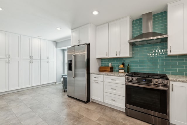 10216 Shadow Way, Dallas, TX 75243 - kitchen with stainless steel appliances, wall chimney exhaust hood, backsplash, white cabinets, and recessed lighting