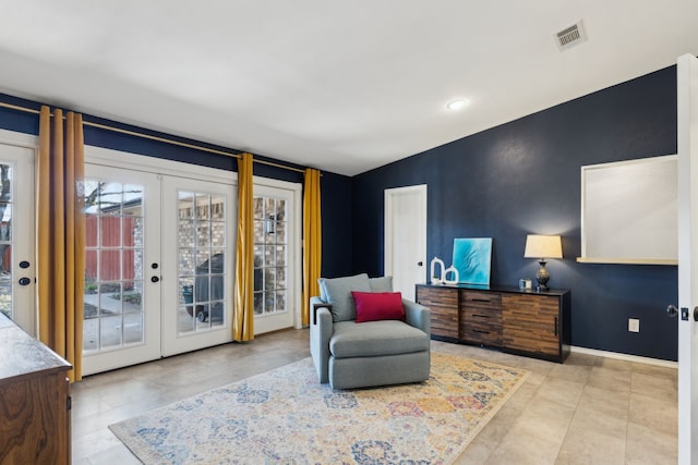 10216 Shadow Way, Dallas, TX 75243 - living area with french doors, tile patterned floors, and recessed lighting