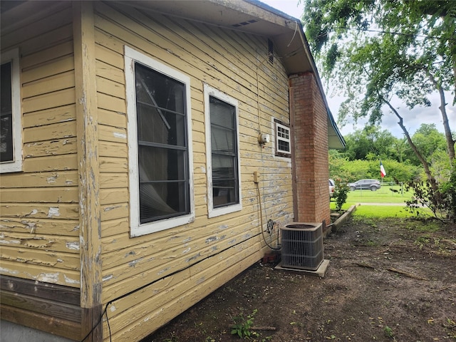 1000 Harrison St, Commerce, TX 75428 - view of side of property with a cooling unit