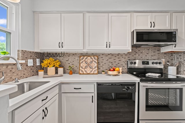 825 W Harwood Rd Unit A, Hurst, TX 76054 - kitchen featuring appliances with stainless steel finishes, white cabinets, light countertops, beverage cooler, and tasteful backsplash
