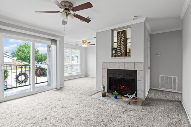 825 W Harwood Rd Unit A, Hurst, TX 76054 - carpeted living room with a tile fireplace, crown molding, and a ceiling fan