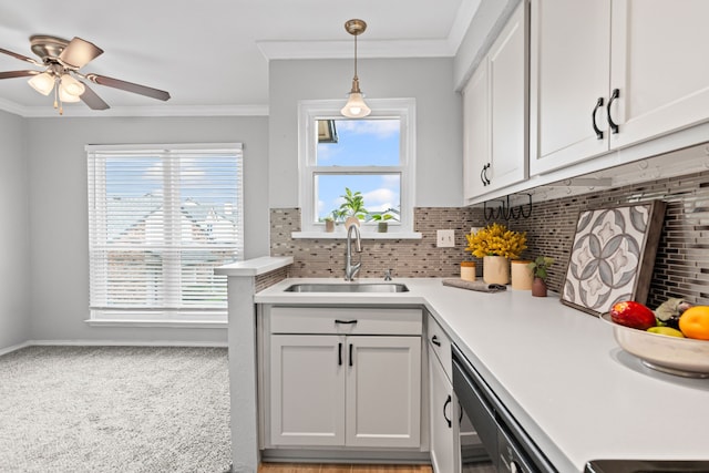 825 W Harwood Rd Unit A, Hurst, TX 76054 - kitchen with light countertops, ceiling fan, backsplash, ornamental molding, and decorative light fixtures