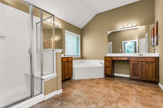 6505 Taprock Dr, Mckinney, TX 75070 - full bath featuring a shower stall, vanity, a garden tub, healthy amount of natural light, and vaulted ceiling