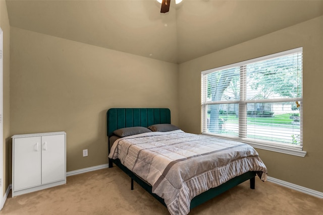 6505 Taprock Dr, Mckinney, TX 75070 - bedroom featuring multiple windows, light carpet, lofted ceiling, and ceiling fan