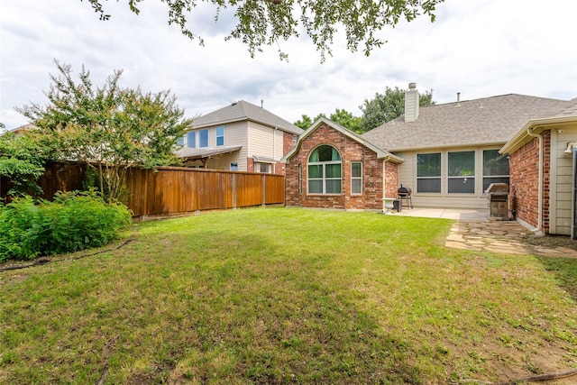 6505 Taprock Dr, Mckinney, TX 75070 - fenced backyard with a patio area