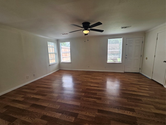 511 W Lake St, Krum, TX 76249 - unfurnished room with dark wood-style floors, ornamental molding, plenty of natural light, and ceiling fan