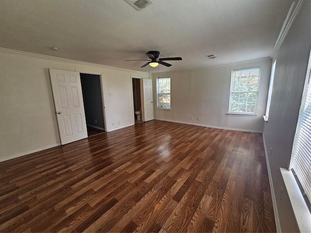 511 W Lake St, Krum, TX 76249 - empty room featuring ornamental molding, dark wood finished floors, and a ceiling fan