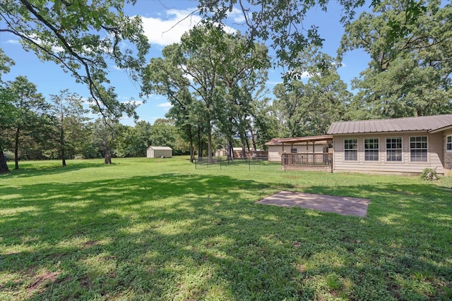 180 Vz County Road 4202, Canton, TX 75103 - view of grassy yard featuring a storage shed and a patio