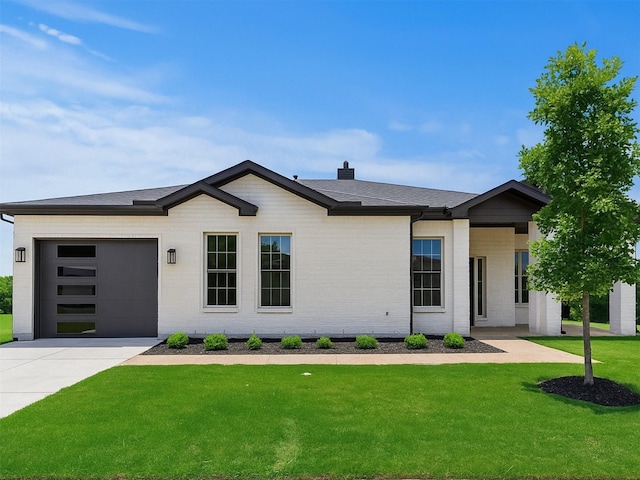 3704 Fireside Ln, Mckinney, TX 75071 - view of front of property with a garage, a front lawn, concrete driveway, a shingled roof, and brick siding