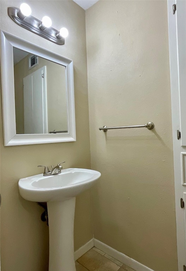 1410 Yarborough Dr, Sherman, TX 75092 - bathroom featuring tile patterned floors and baseboards