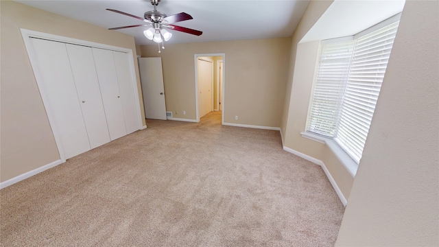 1410 Yarborough Dr, Sherman, TX 75092 - unfurnished bedroom featuring carpet, a closet, and a ceiling fan