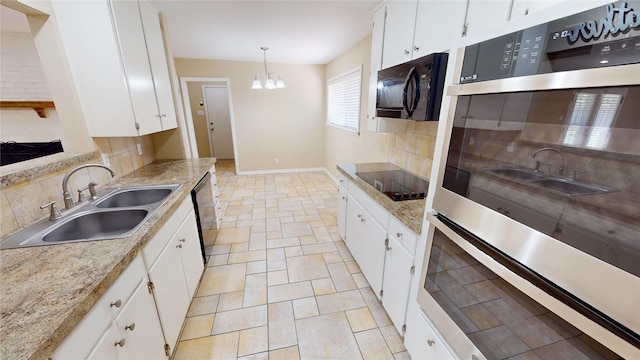 1410 Yarborough Dr, Sherman, TX 75092 - kitchen with black appliances, tasteful backsplash, white cabinetry, a chandelier, and pendant lighting