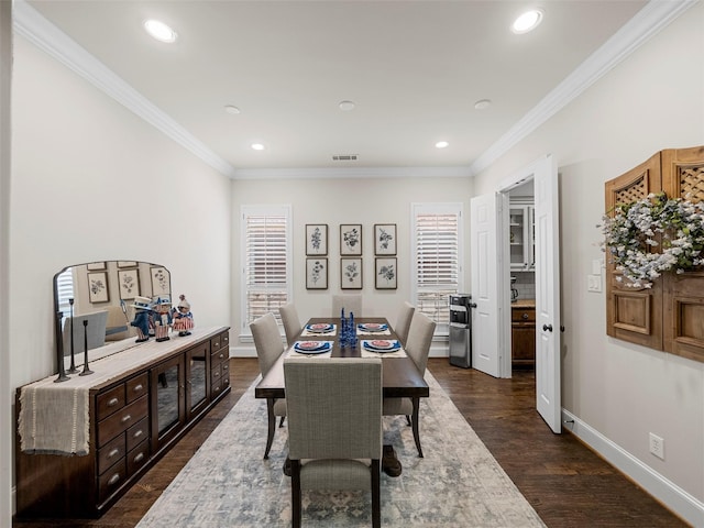3309 Laurel Fork Dr, Mckinney, TX 75070 - dining space featuring dark wood-style flooring, ornamental molding, recessed lighting, and french doors