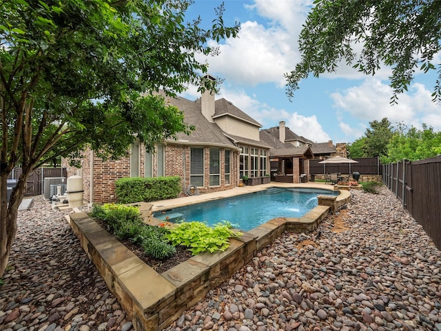 3309 Laurel Fork Dr, Mckinney, TX 75070 - view of swimming pool with a fenced backyard and a patio area