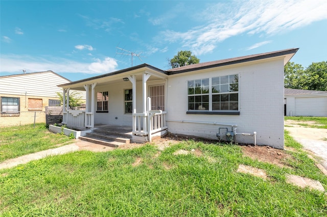 3924 Dismount St, Dallas, TX 75211 - single story home featuring a porch and brick siding