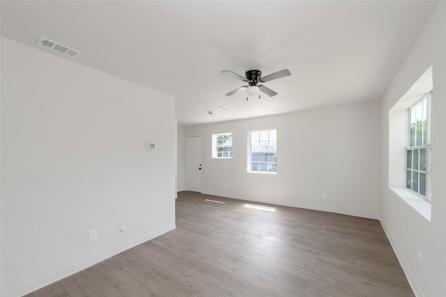 3924 Dismount St, Dallas, TX 75211 - empty room featuring ceiling fan and wood finished floors