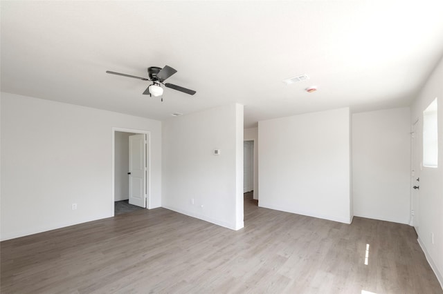 3924 Dismount St, Dallas, TX 75211 - unfurnished room with light wood-type flooring and a ceiling fan