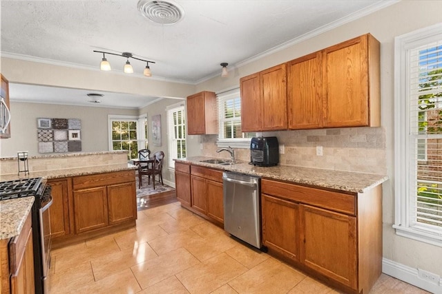 3605 Stadium Dr, Fort Worth, TX 76109 - kitchen featuring appliances with stainless steel finishes, tasteful backsplash, brown cabinetry, crown molding, and light stone counters
