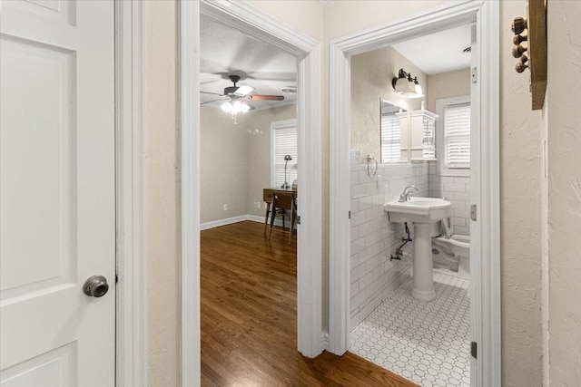 3605 Stadium Dr, Fort Worth, TX 76109 - bathroom featuring wood finished floors and ceiling fan