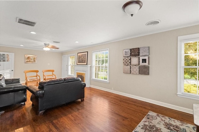 3605 Stadium Dr, Fort Worth, TX 76109 - living room featuring crown molding, dark wood-style flooring, plenty of natural light, ceiling fan, and recessed lighting