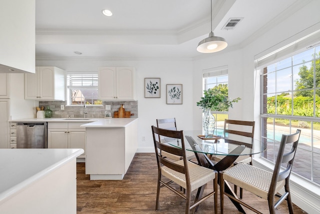 4901 Marcus Dr, Flower Mound, TX 75028 - dining room featuring crown molding, dark wood-style floors, a raised ceiling, and recessed lighting