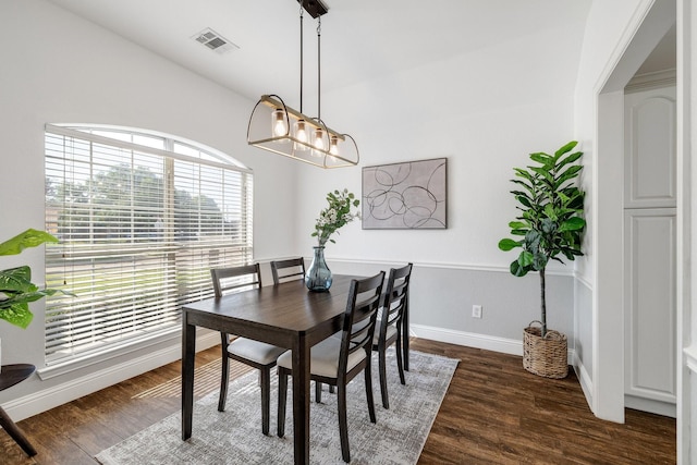 4901 Marcus Dr, Flower Mound, TX 75028 - dining space with dark wood-type flooring and a chandelier