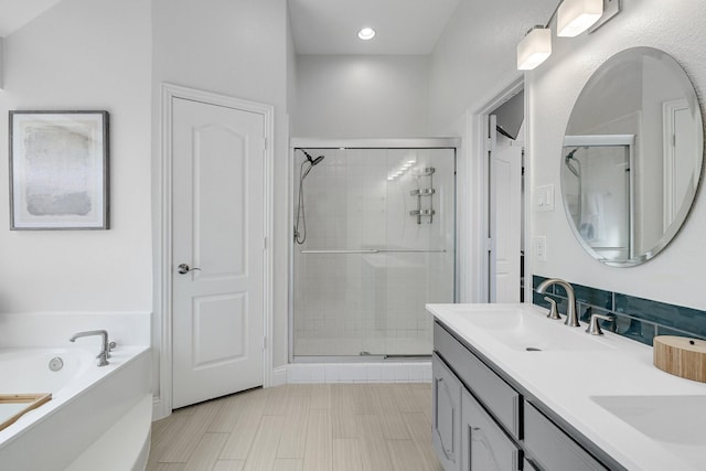 4901 Marcus Dr, Flower Mound, TX 75028 - bathroom featuring a stall shower, double vanity, and a garden tub