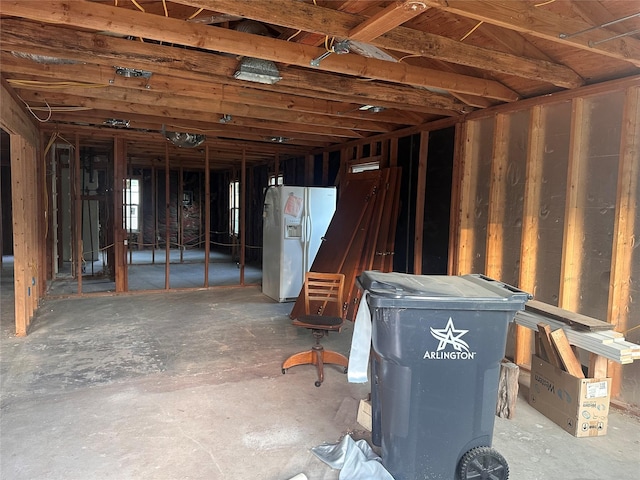 1305 Hadley Dr, Arlington, TX 76011 - basement with white refrigerator with ice dispenser