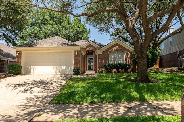 2512 Woodhaven Dr, Flower Mound, TX 75028 - ranch-style home featuring brick siding, a garage, concrete driveway, and a front lawn