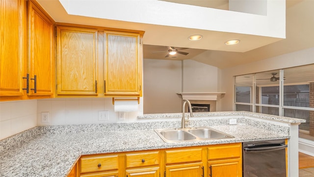 2512 Woodhaven Dr, Flower Mound, TX 75028 - kitchen featuring a ceiling fan, decorative backsplash, a fireplace, a peninsula, and black dishwasher