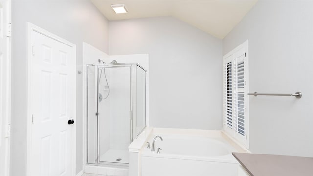 2512 Woodhaven Dr, Flower Mound, TX 75028 - full bathroom featuring a garden tub, a stall shower, and vaulted ceiling