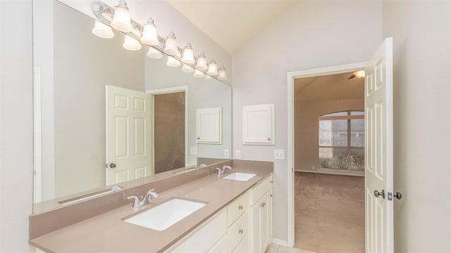 2512 Woodhaven Dr, Flower Mound, TX 75028 - bathroom featuring double vanity and vaulted ceiling