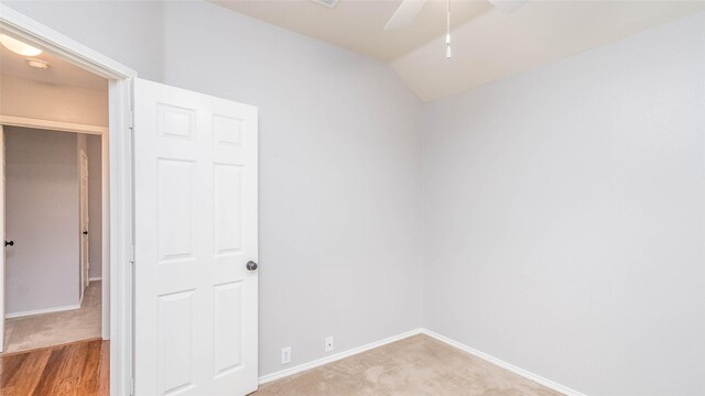 2512 Woodhaven Dr, Flower Mound, TX 75028 - unfurnished bedroom with lofted ceiling, light carpet, and ceiling fan