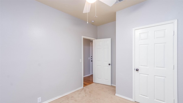 2512 Woodhaven Dr, Flower Mound, TX 75028 - unfurnished bedroom with light colored carpet and ceiling fan